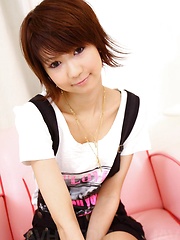 Perky Miriya Hazuki in green satin toyed with a vibrator