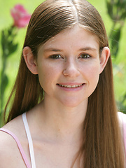 Amateur teenie Lara Brookes posing on the backyard