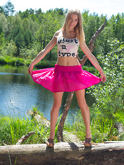 Stunning teen gets naked out in nature to show off her big juicy breasts and the rest of her amazing body.