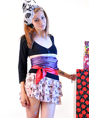 This glamorous teen babe has some style, but she knows exactly how to undress from it into a world of naughtiness.