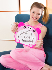 She spends her afternoon with spreading those long legs to show off that fine pink pussy she has in store.