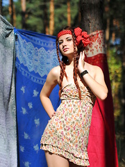 Gorgeous teen gets naked, and shows off her amazing curves and tits with a great style and a smile to compliment it.