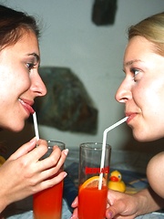 Two sexy lesbian teenage girls caressing teenage coochies