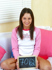 Nude cutie likes rubbing her bald and wet teenage snatch