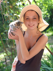 Her amazing boobs and hot curves look even more amazing in the sunshine as has some sexy fun in the water.