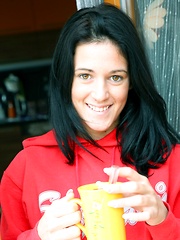 Muscles stretching teenager rubs her amazing clit indoors