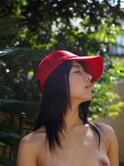 Kana Yume Asian shows nude playful tits and hairy cunt in nature